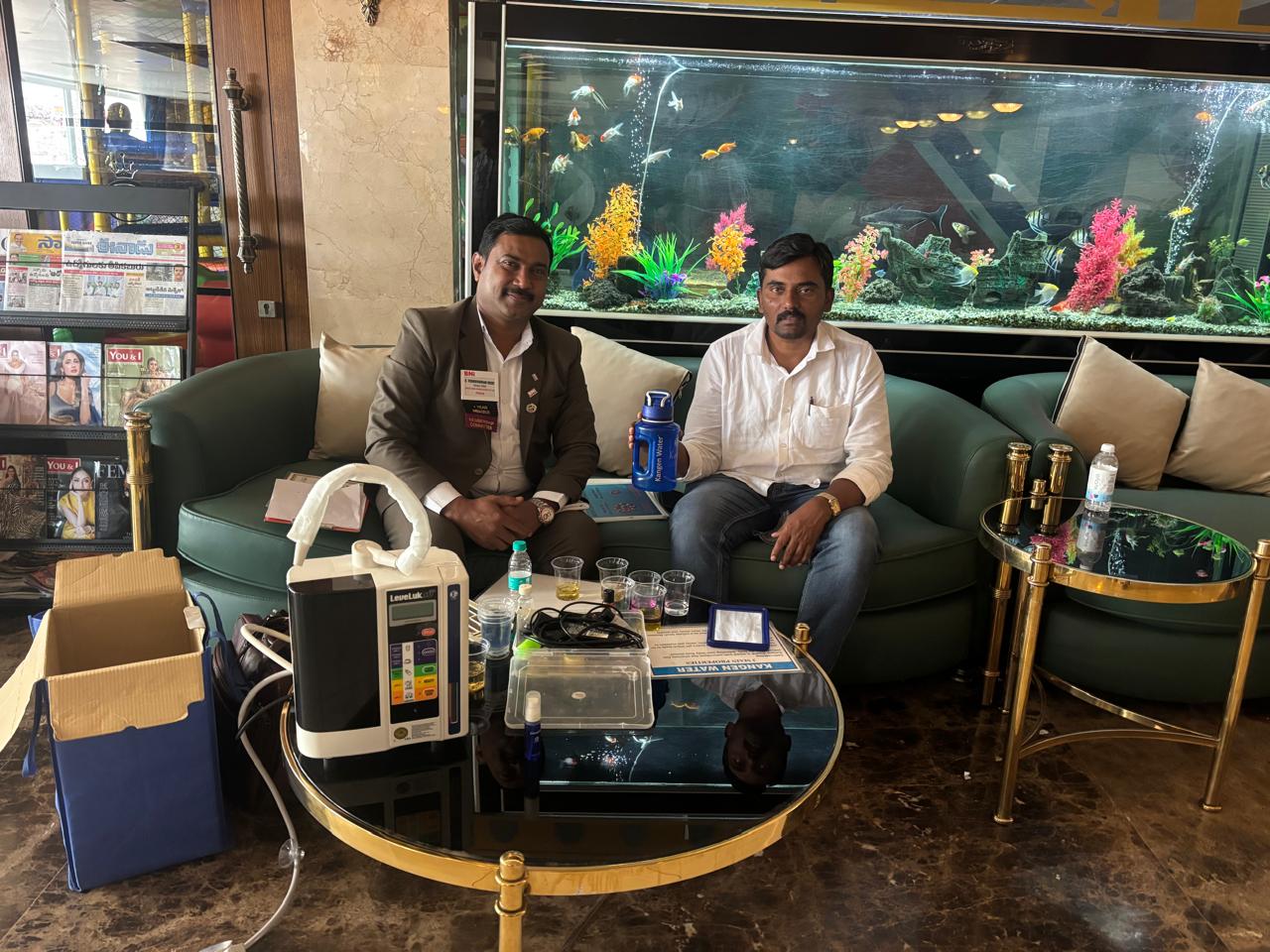 Live Kangen Water demonstration with a LeveLuk device in a hotel lounge